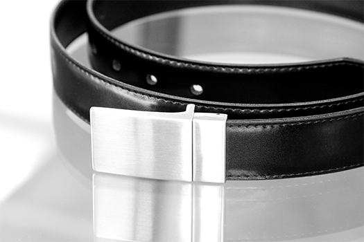 Grey scale close up of KARMA belt