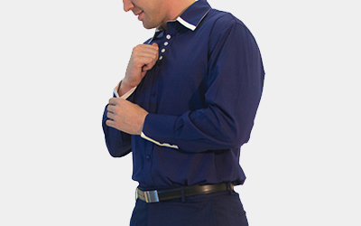 Model wearing men's navy shirt with white accent