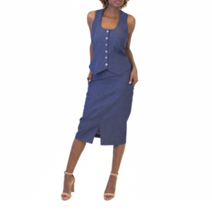 Person in a blue two-piece set: sleeveless vest with white buttons and matching knee-length skirt with front slit, hands in pockets.