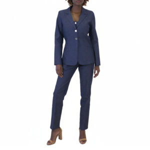 Stylish person in dark blue denim pantsuit with two white buttons, white top, and light brown block heel sandals.