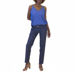 Woman in blue V-neck camisole, dark blue trousers, and tan block-heel sandals, hands clasped behind back.