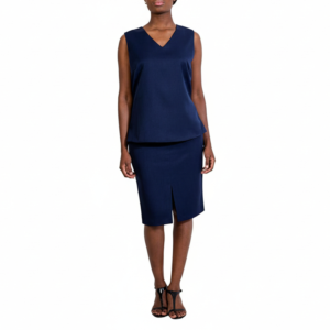 Standing woman in a navy blue sleeveless V-neck top, matching pencil skirt with front slit, and black sandals. Professional women's fashion.