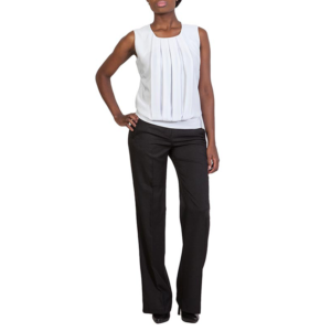 Stylish woman in a chic white pleated sleeveless top and tailored black wide-leg trousers, striking a pose with her left hand on her hip.