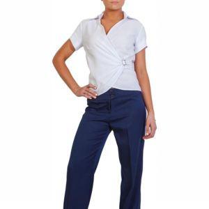 Stylish person in a white short-sleeve wrap top with a silver buckle and navy wide-leg trousers, left hand on hip.