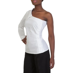 A person wearing a white, asymmetrical Raven Shirt with one long sleeve and one bare shoulder, paired with black pants, stands with one hand on their hip against a white background.