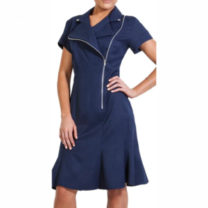 Woman in a stylish navy blue dress featuring short sleeves, lapel collar, and an asymmetrical silver zipper, hand on hip.