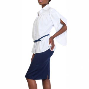 Elegant white Zetula blouse with stylish sleeve design and navy blue skirt with side slit, perfect for sophisticated office wear or casual outings.