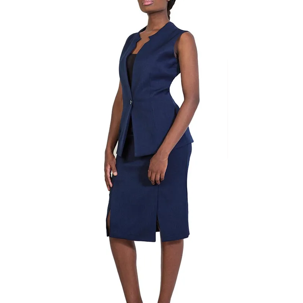 Professional woman wearing a navy blue sleeveless vest and knee-length pencil skirt with front slits.