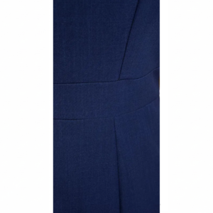 Textured navy blue fabric with a subtle horizontal stripe and fine vertical stitching.