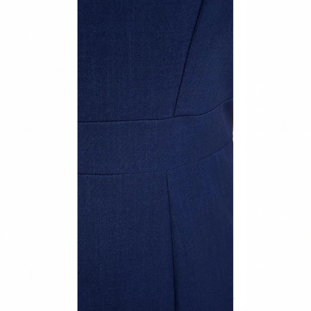 Textured navy blue fabric with a subtle horizontal stripe and fine vertical stitching.