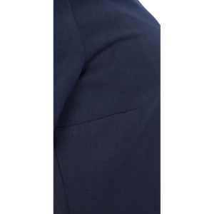 Tailored dark blue suit jacket shoulder and upper back, with a prominent horizontal seam.