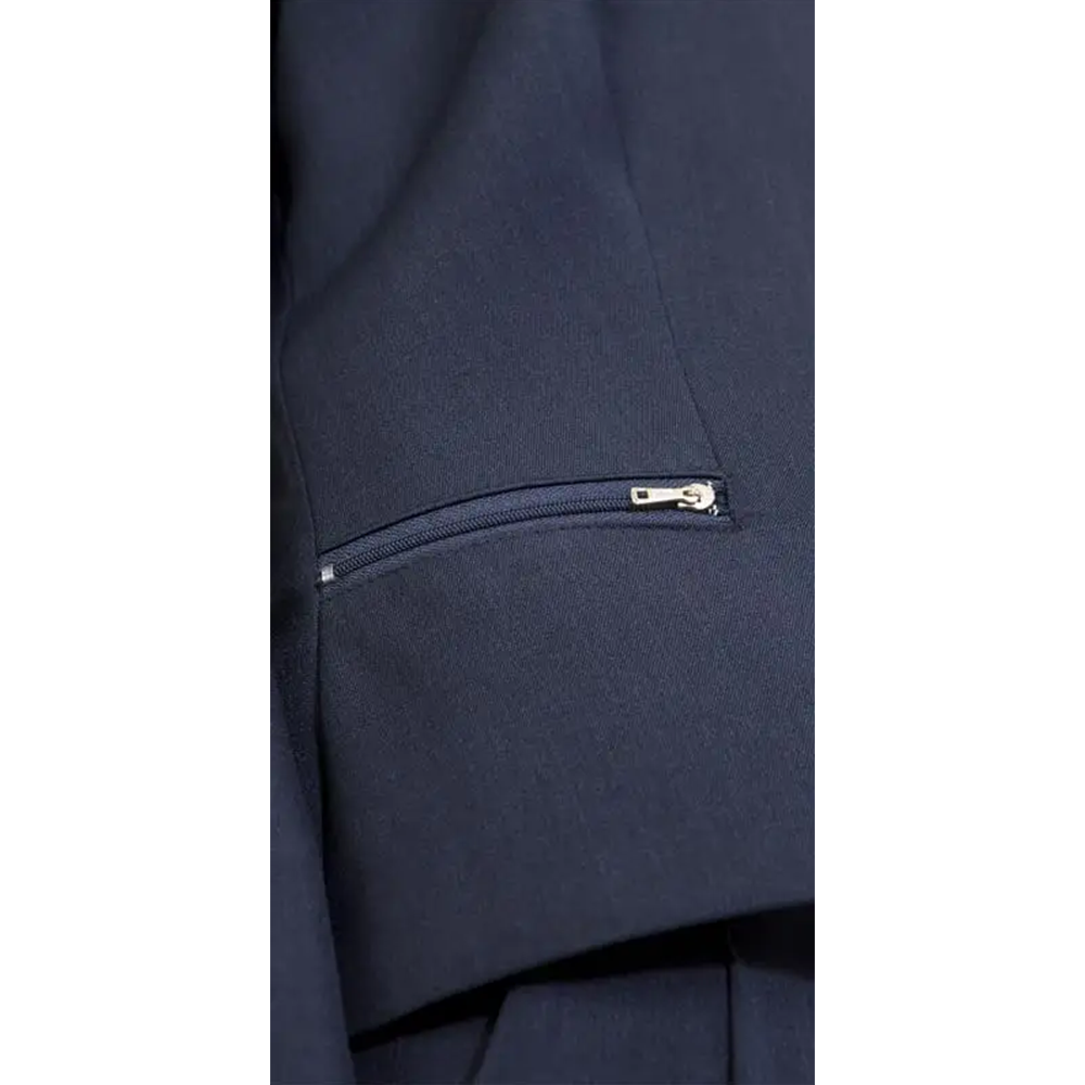 Close-up of textured deep blue fabric with a partially open horizontal zipper and a silver pull tab.