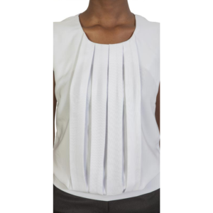 Person's torso in a white pleated sleeveless top with a gathered hem.