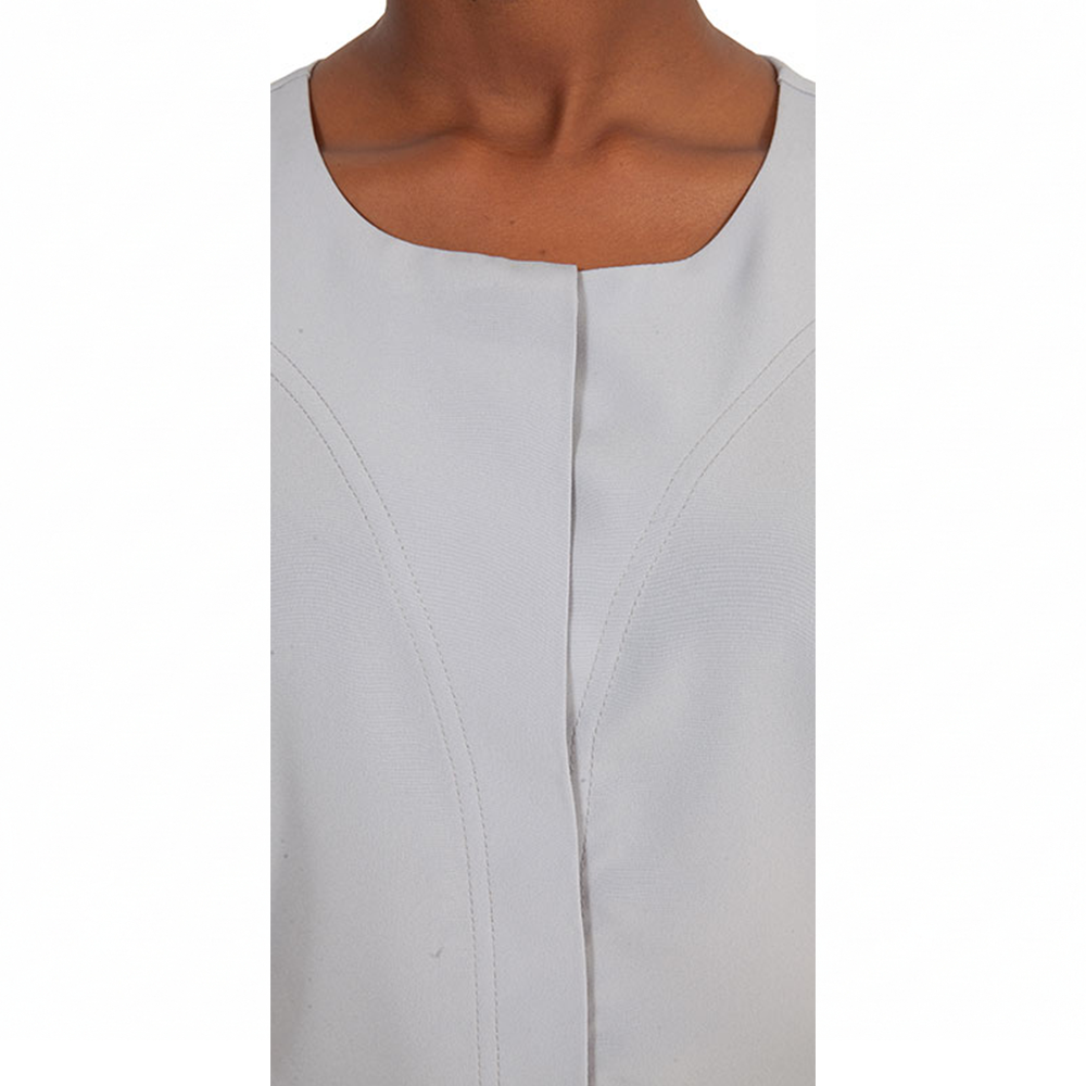 Light grey top featuring a rounded square neckline and prominent curved front seams, worn on a person's upper body.