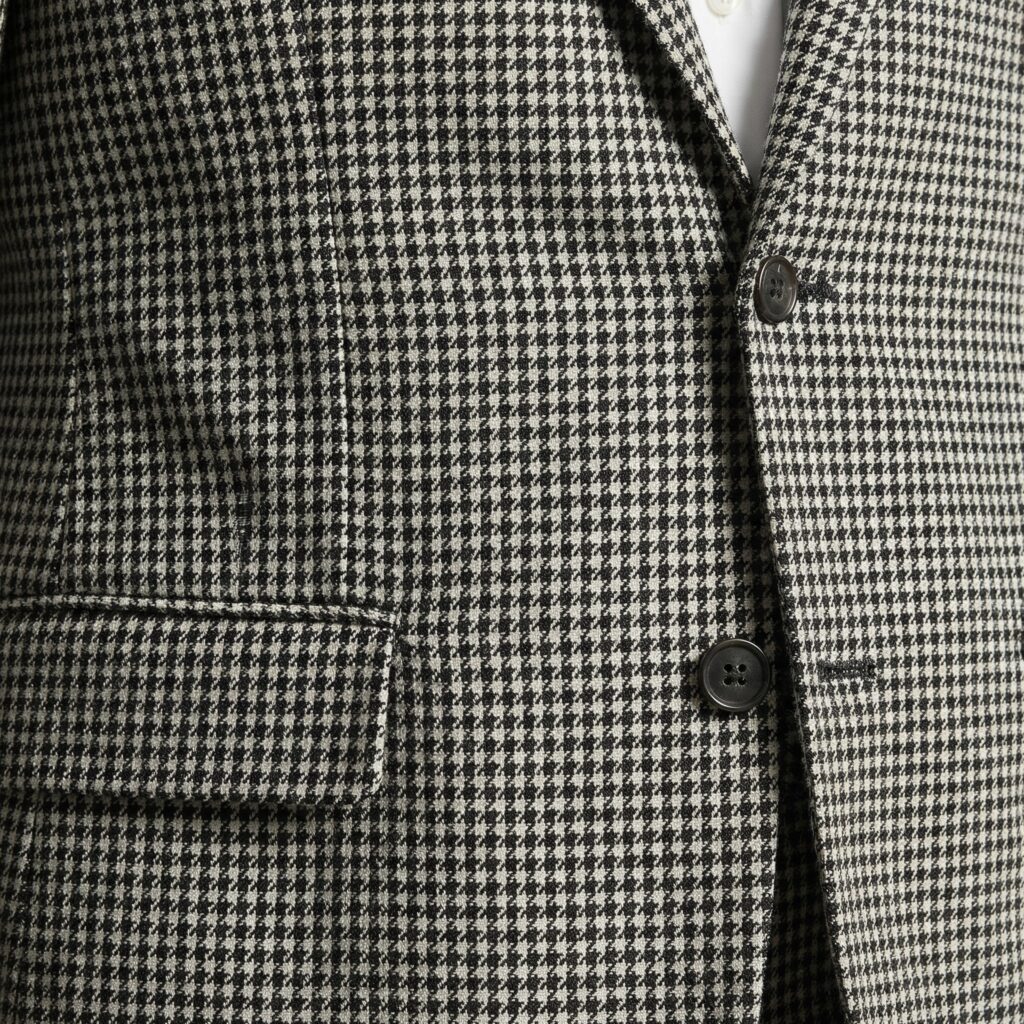 Refreshed Corporate Style with Great Energy 2 Elegant men's formal jacket in classic herringbone pattern, size 34, perfect for sophisticated occasions. Crafted with high-quality fabric for a refined look and comfortable fit.